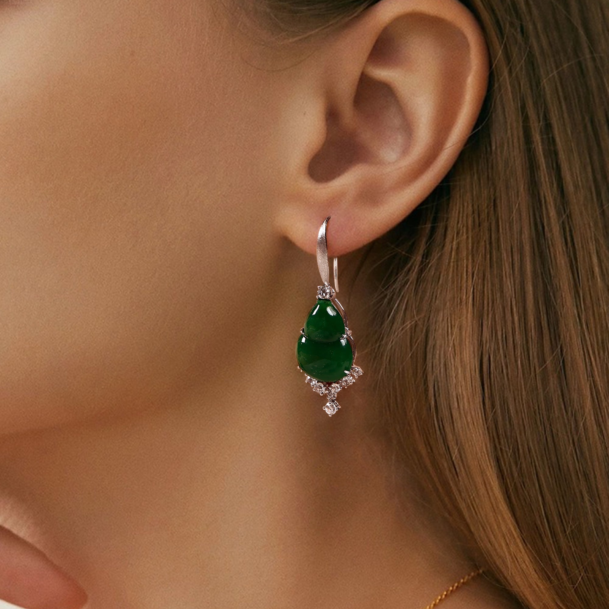 The model is Wearing 18k White Gold Exquisite High Quality Grade A Jade Drop Earring