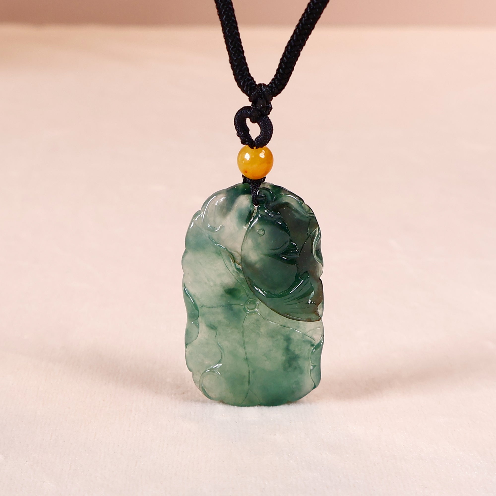 Jade pendant necklace carved with carp and lotus leaf