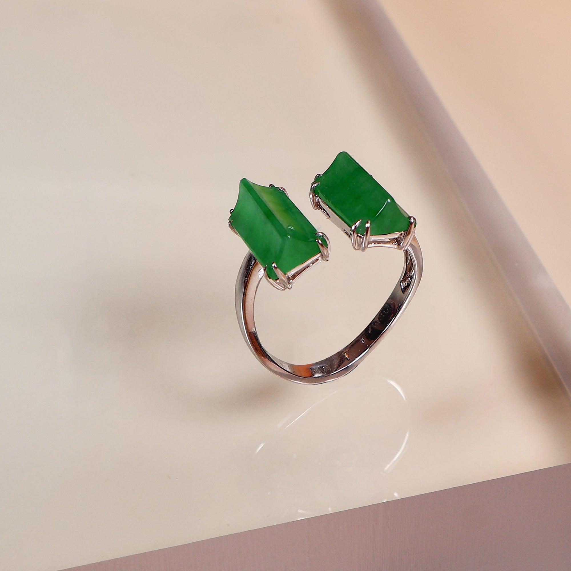 Semi-open jade ring with two jade stones