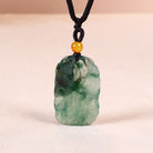 Jade pendant necklace carved with carp and lotus leaf