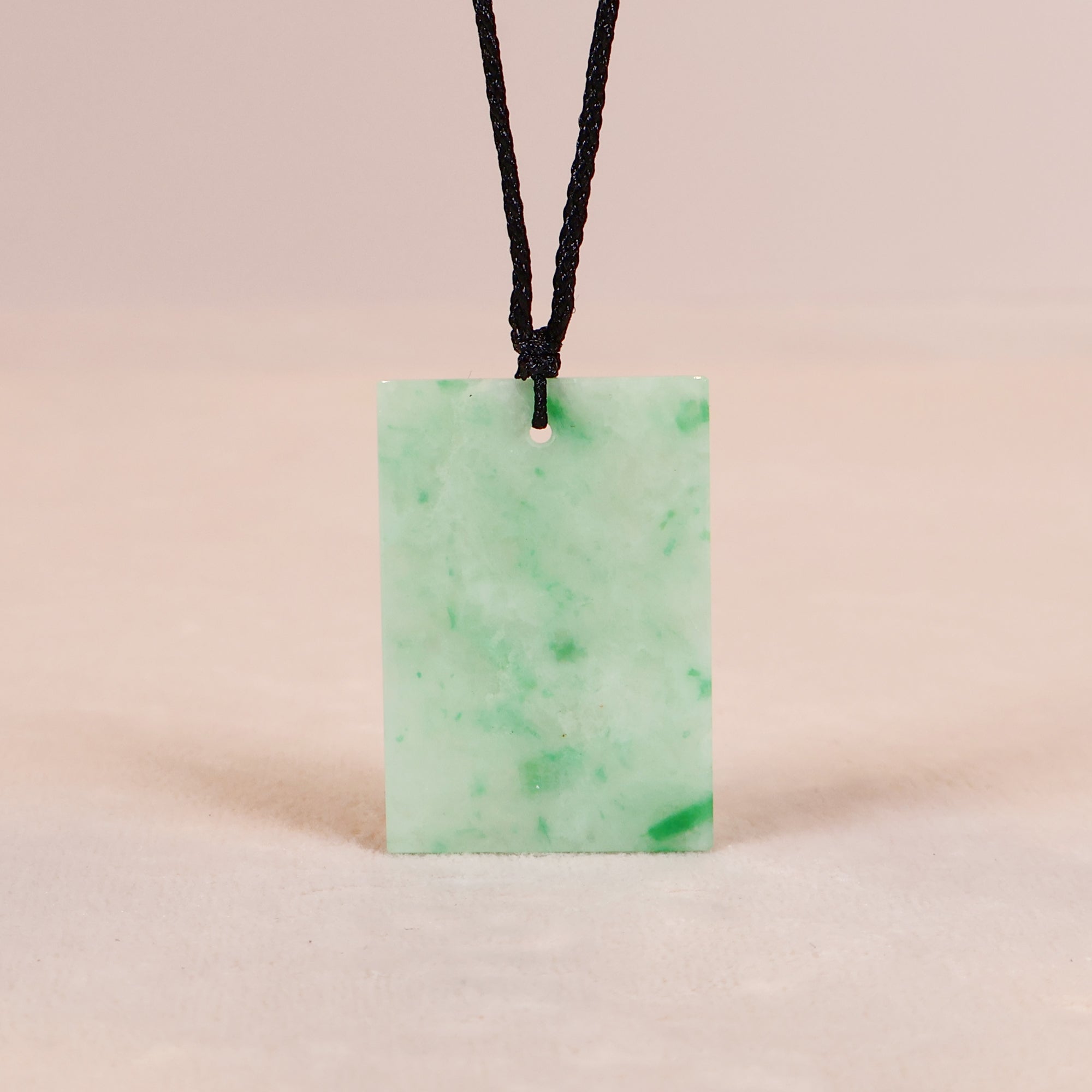 The back of Gransky's Natural Myanmar Rectangular Jade Pendant Necklace