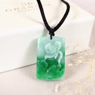 Green rectangular jade carved lotus shape pendant